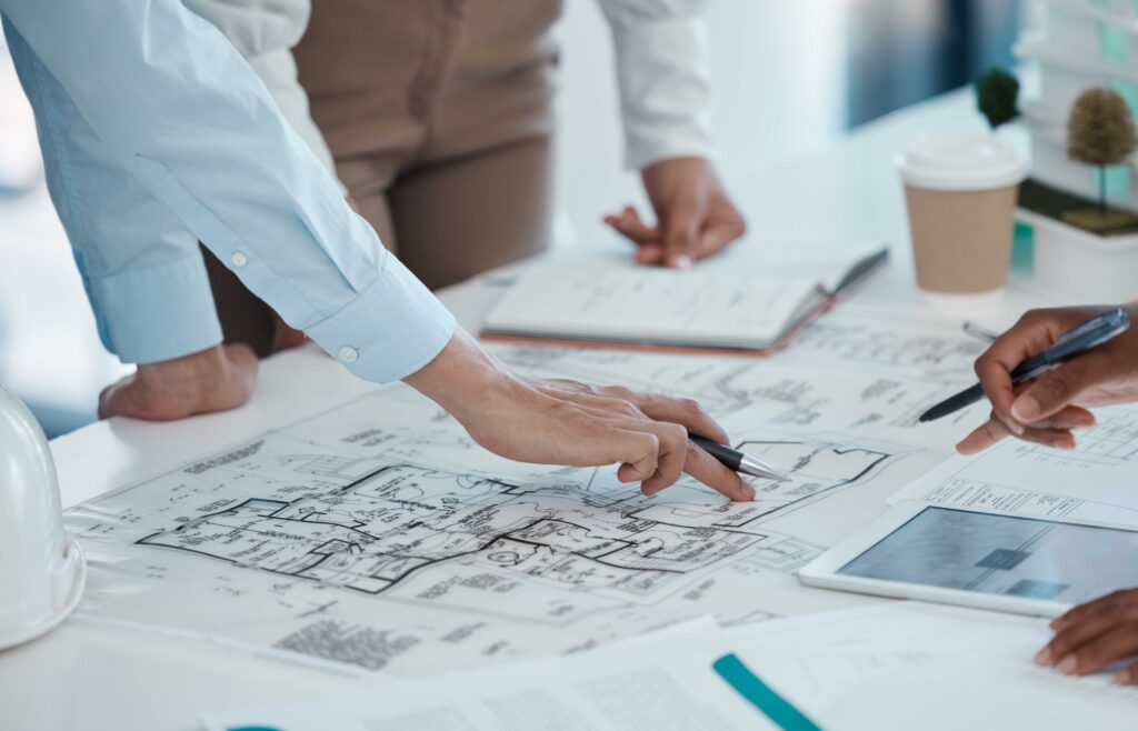 architect hands and planning building on paper fo 2025 04 06 01 46 10 utc scaled